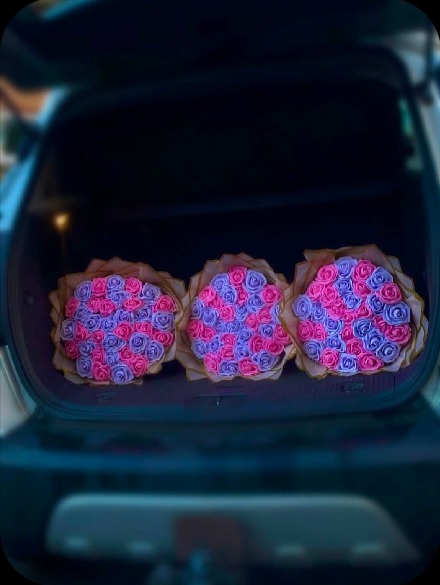 Three pink and lilac light-up bouquets